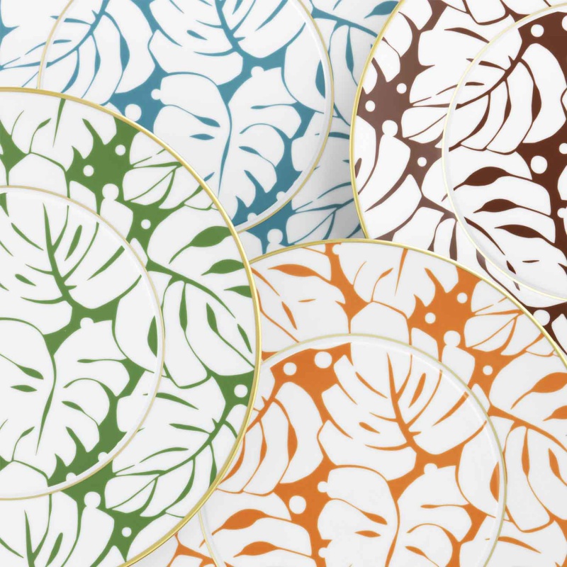 Teller mit bunten Blättermustern, grünes, blaues, braunes und orangefarbenes Design. Fürstenberg Porzellan.