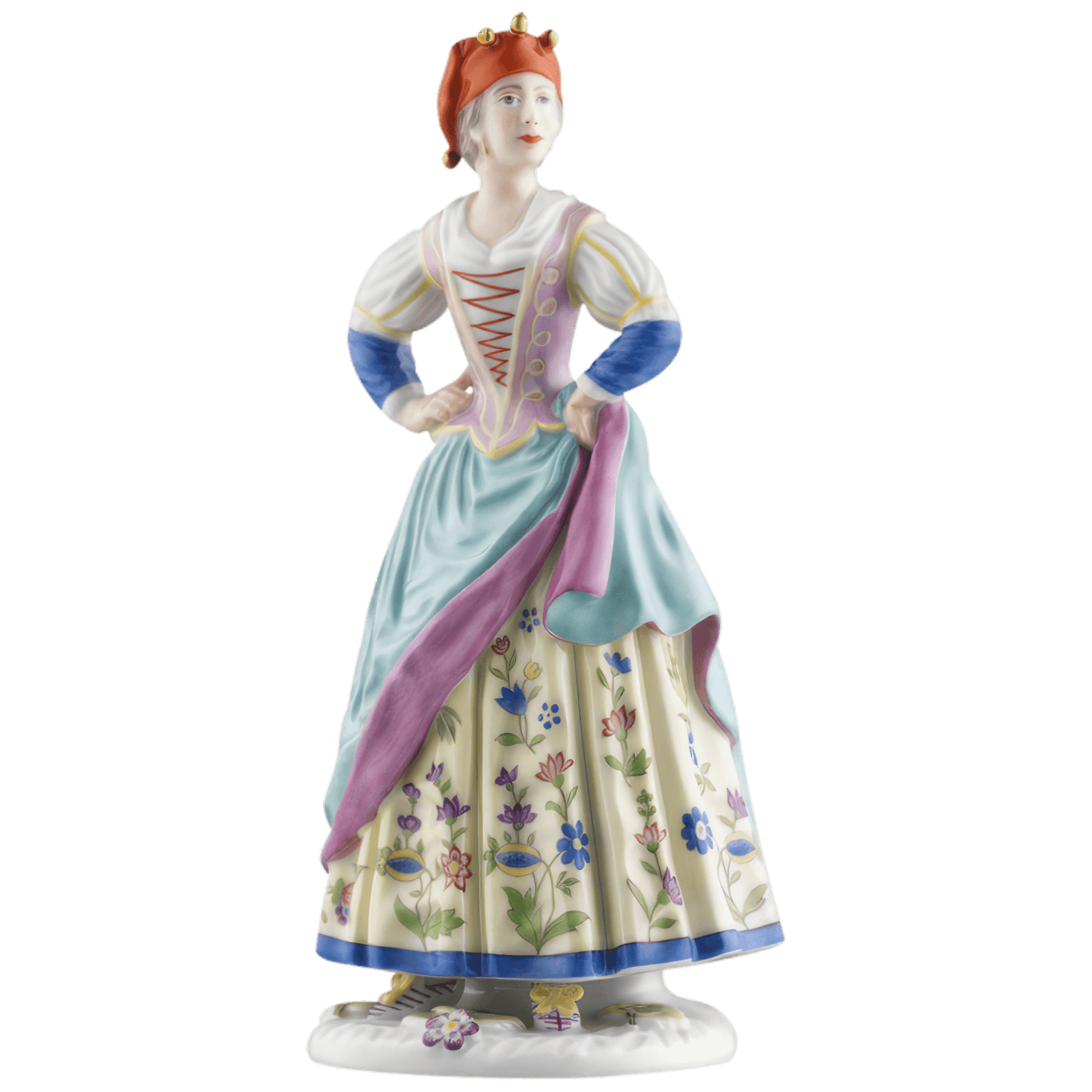 Porzellanfigur steht mit bunter Tracht und roter Kopfbedeckung, Hände in Hüfte. Fürstenberg Porzellan.
