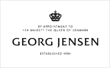 Textlogo „By appointment to Her Majesty the Queen of Denmark, Georg Jensen.“ Fürstenberg Porzellan.